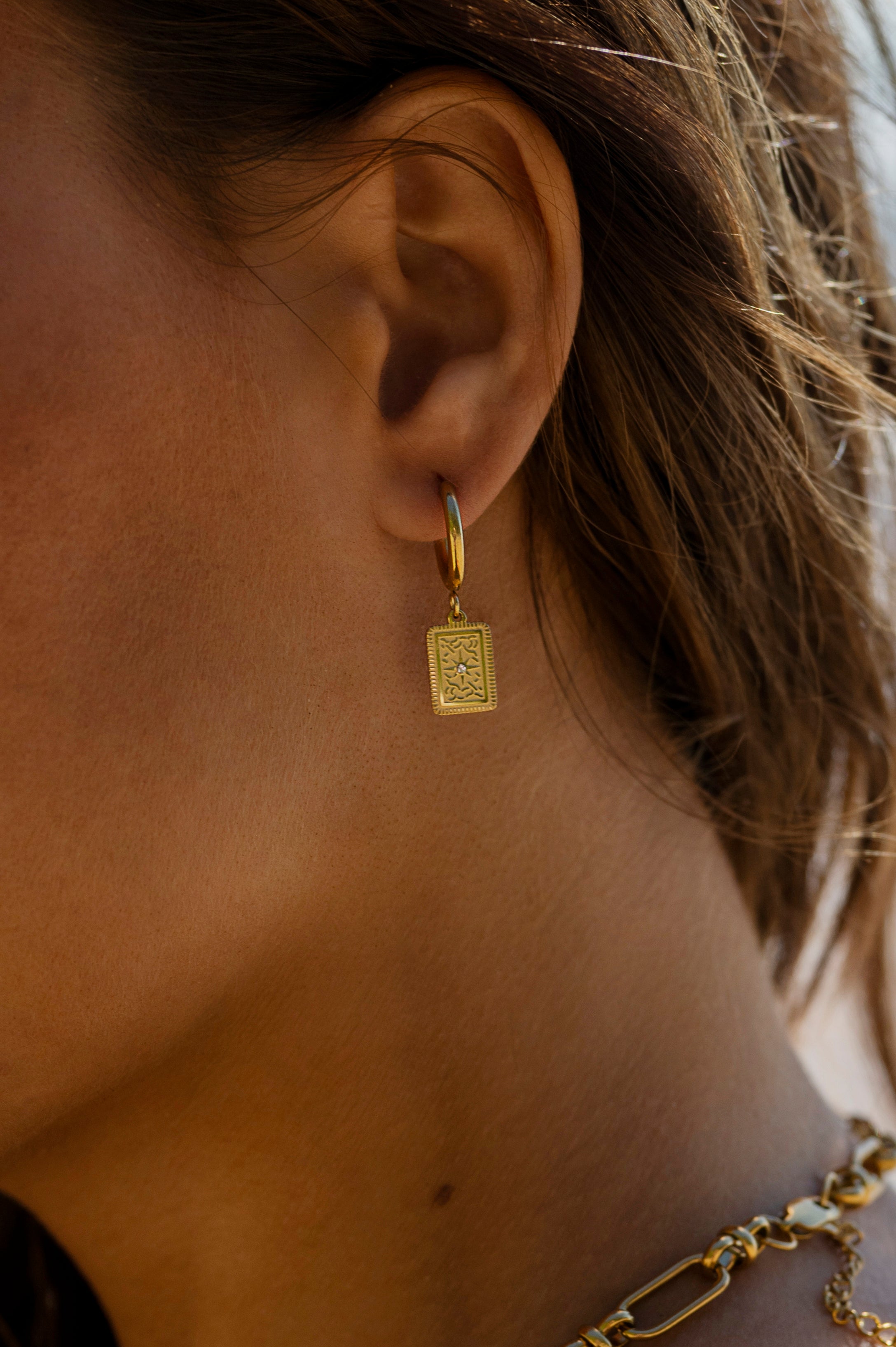 GOLD CELESTIAL TAG HUGGIE CHARM EARRING