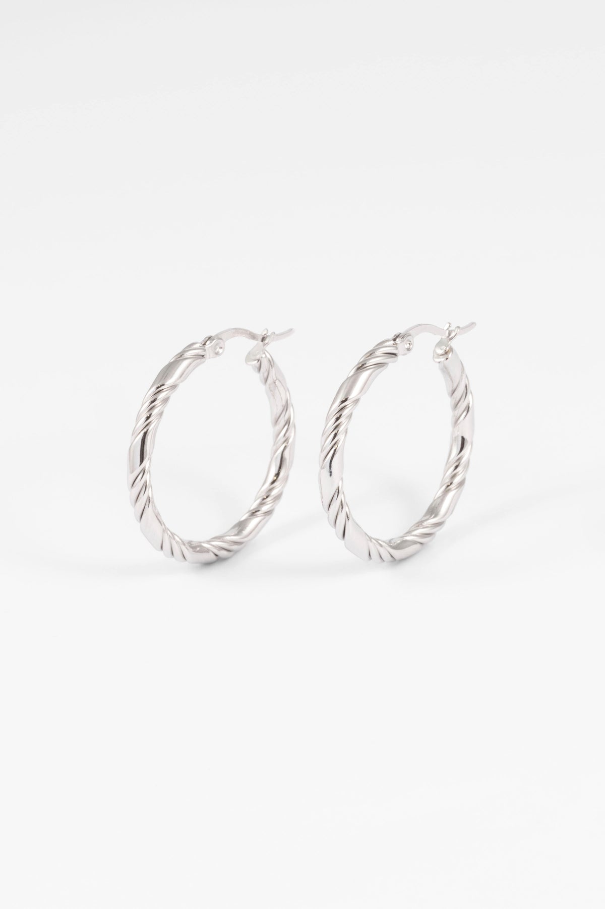 WATERPROOF SILVER TWISTED HOOP EARRINGS