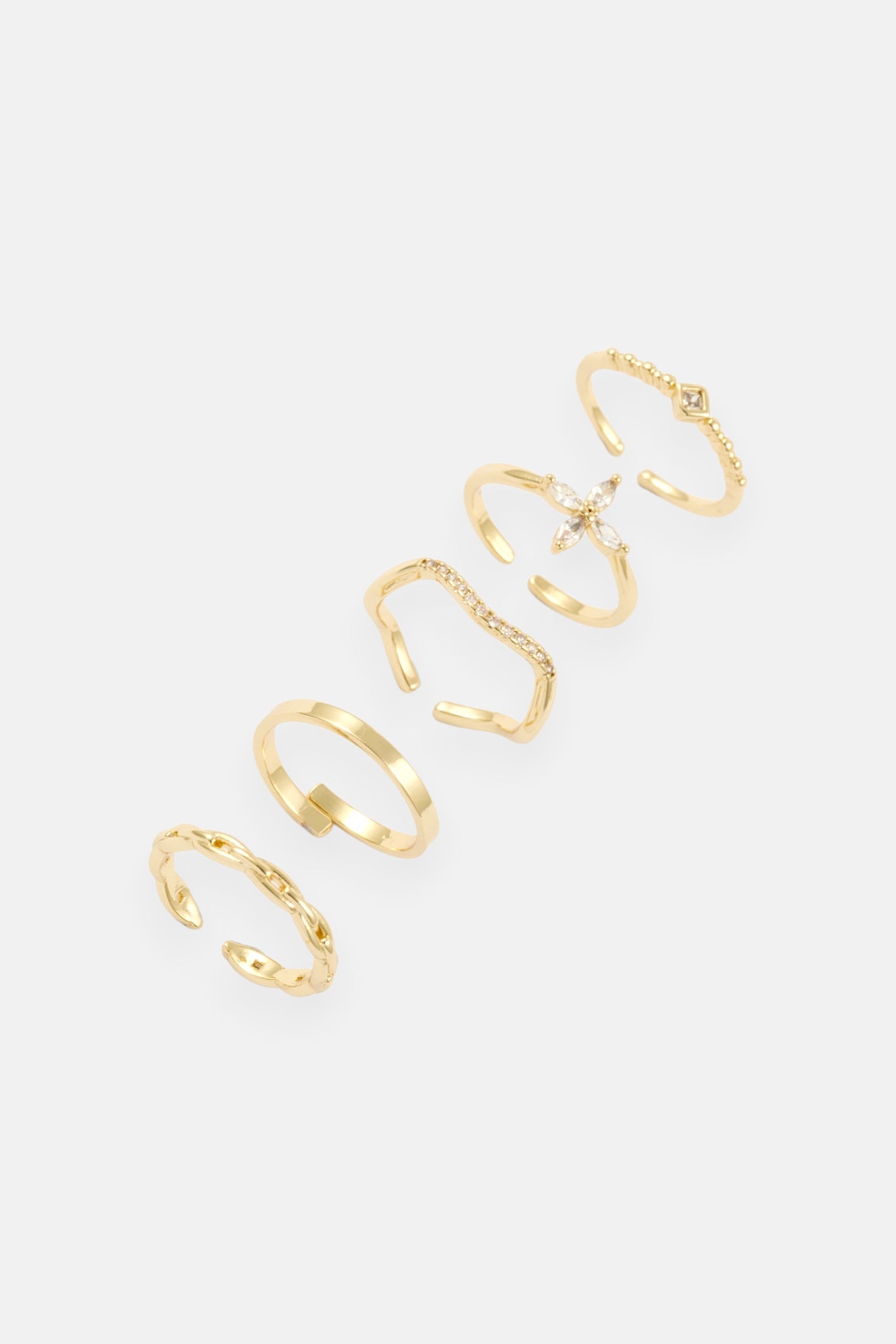 GOLD FLOWER CZ PAVE WAVE LINK 5 RING ADJ PACK